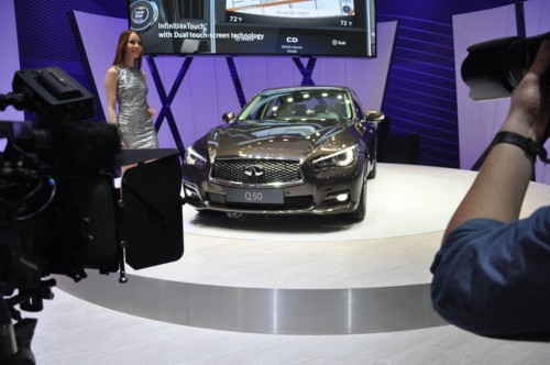 Infiniti model on stand Geneva 2013