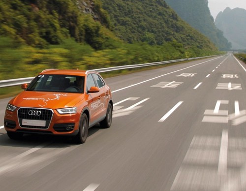 Audi Q5 orange China road