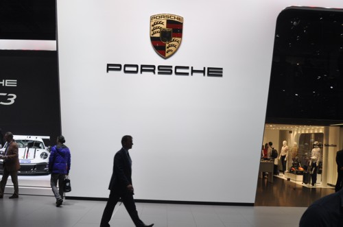 Porsche stand 2013 Geneva man walking past