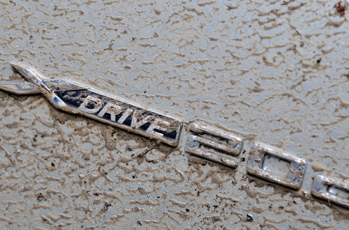 BMW x-drive badge muddy